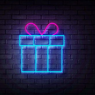 Blue Gift NEON LED Sign designed in neon light against a dark brick wall, perfect for custom sign requests.