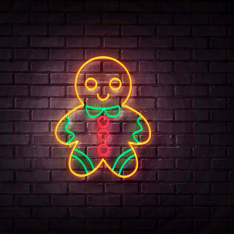 Gingerbread Man NEON LED Sign on a brick wall, colorful and vibrant design, perfect for festive decorations.