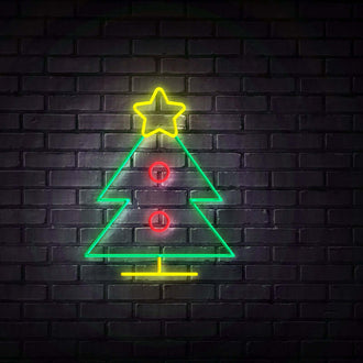 Colourful Christmas Tree NEON LED Sign illuminated against a dark brick wall, perfect for festive decor.