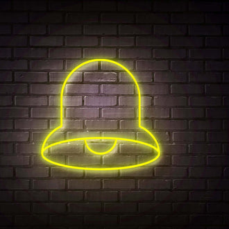 Plain Bell NEON LED Sign glowing against a brick wall, showcasing a customizable neon design option.