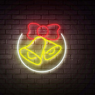 Circled Bells with Red Ribbon NEON LED Sign illuminated in vibrant colors on a dark brick wall.