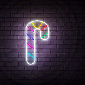Candy Cane NEON LED Sign illuminating a brick wall with vibrant colors and a festive design.