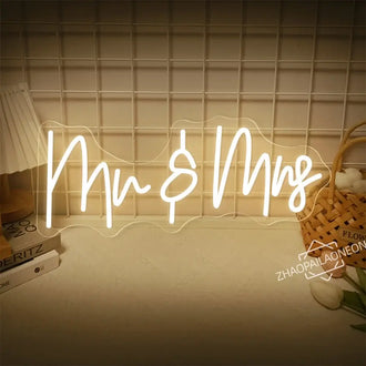 Custom LED neon sign displaying 'Mr & Mrs' for wedding decor or bedroom glow, powered by USB with dimmer control.