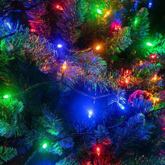 Retro LED Christmas Fairy Lights - USB Powered - 10m, 100 LED illuminating a Christmas tree with colorful bulbs.