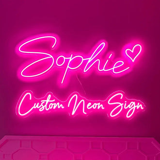 Custom pink LED neon sign with the name 'Sophie' on a vibrant pink background.